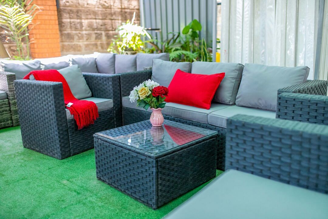 4 Seater Outdoor Sofa with Coffee Table & Ottoman.