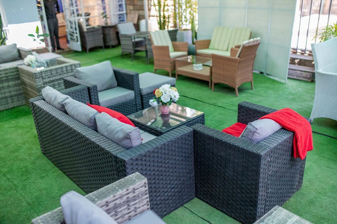 4 Seater Outdoor Sofa with Coffee Table & Ottoman.